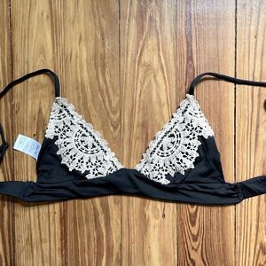 Super cute teeny bikini top, Size Small. Cream lace and black.